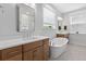 Bathroom with soaking tub, and double sink at 1535 Low Pk St, Mount Pleasant, SC 29464