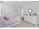 Bright bedroom featuring white furniture, polka dot walls, and carpet floors at 1535 Low Pk St, Mount Pleasant, SC 29464