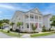 Charming home exterior features double porches, lush landscaping, and classic architectural details at 1535 Low Pk St, Mount Pleasant, SC 29464