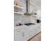 Kitchen with stainless steel appliances and floating shelves at 1535 Low Pk St, Mount Pleasant, SC 29464