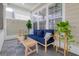 Relaxing outdoor patio includes modern furniture and decorative plants at 1535 Low Pk St, Mount Pleasant, SC 29464