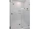 Modern shower features white subway tile walls, a rainfall shower head, and seamless glass door at 1535 Low Pk St, Mount Pleasant, SC 29464