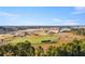 Vast complex of baseball fields surrounded by trees offering ample recreational space at 154 Calm Water Way, Summerville, SC 29486