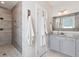 Modern bathroom featuring a walk-in shower, double sink vanity, and stylish finishes at 154 Calm Water Way, Summerville, SC 29486