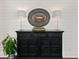 Stylish sideboard with decorative lamps and a mirror against a shiplap wall at 154 Calm Water Way, Summerville, SC 29486