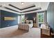 Bright main bedroom with large windows and trey ceiling at 154 Calm Water Way, Summerville, SC 29486