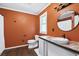 Bathroom featuring an ornate counter top with a vessel sink and warm paint at 162 Whippoorwill Dr, Summerville, SC 29483