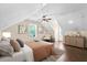 Bedroom with warm colors, hardwood floors, slanted ceilings and natural light at 162 Whippoorwill Dr, Summerville, SC 29483