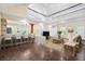 A spacious living room with high ceilings, an open floor plan, and modern furnishings at 162 Whippoorwill Dr, Summerville, SC 29483