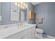 Bathroom features a modern vanity with a marble countertop and tiled floors at 1713 Boone Hall Dr # 1082, Charleston, SC 29407
