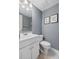Half bathroom featuring modern fixtures and stylish tile flooring at 1713 Boone Hall Dr # 1082, Charleston, SC 29407