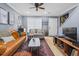 Comfortable living room with stylish furniture, modern lighting, and a staircase at 1713 Boone Hall Dr # 1082, Charleston, SC 29407