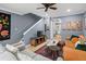 Spacious living room with comfortable seating, stylish decor, and wooden entertainment center at 1713 Boone Hall Dr # 1082, Charleston, SC 29407