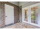 Outdoor patio featuring brick accents and multiple entry points at 1713 Boone Hall Dr # 1082, Charleston, SC 29407