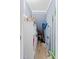 Organized storage space with shelving and various cleaning supplies and equipment at 1713 Boone Hall Dr # 1082, Charleston, SC 29407