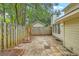 Backyard features brick-lined hardscape with a fenced yard, a shed and house at 18 Indigo Ln, Goose Creek, SC 29445