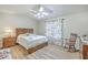 Cozy bedroom includes a ceiling fan, floral curtains and a rocking chair at 18 Indigo Ln, Goose Creek, SC 29445