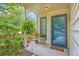 Inviting front porch adorned with plants, decor, and a 'Welcome' mat, creating a warm entrance at 18 Indigo Ln, Goose Creek, SC 29445