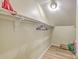 Cozy walk-in closet featuring hardwood floors and a bar for easy organization at 18 Indigo Ln, Goose Creek, SC 29445