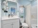 Bright bathroom featuring a spacious vanity and ample storage, contemporary mirror, and a shower and tub combo at 18 Tupelo Trl, Edisto Island, SC 29438