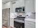 Close-up of modern stainless steel kitchen appliances and countertops at 18 Tupelo Trl, Edisto Island, SC 29438