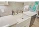 Close-up of kitchen sink featuring a modern faucet, and subway tile backsplash at 18 Tupelo Trl, Edisto Island, SC 29438