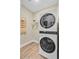 Functional laundry room with stacked washer and dryer and space saving design perfect for chores at 18 Tupelo Trl, Edisto Island, SC 29438
