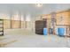 Expansive storage area featuring a large black water tank, blue water tanks and wooden slat walls at 18 Tupelo Trl, Edisto Island, SC 29438