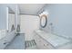 Charming bathroom with modern vanity, decorative mirror, and shower with curtain at 2011 N Highway 17 # 1400A, Mount Pleasant, SC 29466