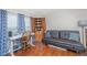Versatile bedroom with a sofa bed, desk, and wooden armoire in a well-lit space at 2011 N Highway 17 # 1400A, Mount Pleasant, SC 29466