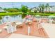 Scenic deck overlooking a tranquil pond, complete with outdoor seating for entertaining or peaceful relaxation at 2011 N Highway 17 # 1400A, Mount Pleasant, SC 29466