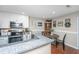 Bright kitchen features white cabinets, stainless steel appliances, and granite countertops at 2011 N Highway 17 # 1400A, Mount Pleasant, SC 29466