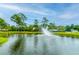 Picturesque pond with a fountain, enhancing the community's serene atmosphere and natural beauty at 2011 N Highway 17 # 1400A, Mount Pleasant, SC 29466