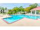 Community pool with lounge chairs, shaded seating, and a meticulously maintained pool house at 2011 N Highway 17 # 1400A, Mount Pleasant, SC 29466