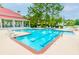 Resort-style pool area with comfortable lounge chairs, lush landscaping, and a vibrant atmosphere for relaxation at 2011 N Highway 17 # 1400A, Mount Pleasant, SC 29466