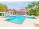Community pool area with a charming clubhouse, perfect for social gatherings and enjoying a refreshing swim at 2011 N Highway 17 # 1400A, Mount Pleasant, SC 29466