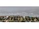Stunning aerial view showcasing beachfront houses next to the ocean at 210 Ocean Blvd, Isle of Palms, SC 29451