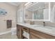 Elegant bathroom features double sinks, marble countertop, and ample storage for a spa-like experience at 210 Ocean Blvd, Isle of Palms, SC 29451