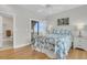 Inviting bedroom with balcony access provides stunning ocean views and a peaceful atmosphere at 210 Ocean Blvd, Isle of Palms, SC 29451
