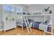 Charming ' bedroom with bunk beds, dresser, and ample space for sleep and play at 210 Ocean Blvd, Isle of Palms, SC 29451