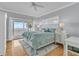 Bright bedroom boasts ocean views, a private balcony, and coastal-inspired decor for a serene retreat at 210 Ocean Blvd, Isle of Palms, SC 29451