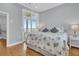 Serene bedroom showcases ocean views, seaside accents, and balcony access for a tranquil coastal retreat at 210 Ocean Blvd, Isle of Palms, SC 29451