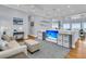 Comfortable living room featuring a TV and stylish built-in storage and display features at 210 Ocean Blvd, Isle of Palms, SC 29451