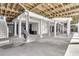 View of house raised on pillars, showing underneath parking and storage at 210 Ocean Blvd, Isle of Palms, SC 29451