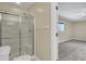 Bathroom featuring a clear glass shower door, white towel rack, and toilet at 213 Turtle Point Rd, Summerville, SC 29483