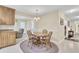 Cozy dining area with wooden table and chairs, adjacent to the kitchen and living spaces at 213 Turtle Point Rd, Summerville, SC 29483