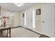 Spacious foyer with neutral walls, tile flooring, and a front door with sidelight windows at 213 Turtle Point Rd, Summerville, SC 29483