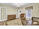 Charming office space with hardwood floors, natural light, and classic wooden furniture at 213 Turtle Point Rd, Summerville, SC 29483