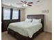Spacious bedroom with a large bed, ceiling fan, and plenty of natural light at 224 Market Hall St, Moncks Corner, SC 29461