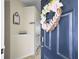 Charming entryway with a decorated front door, stylish accents, and a view into the home's interior at 224 Market Hall St, Moncks Corner, SC 29461
